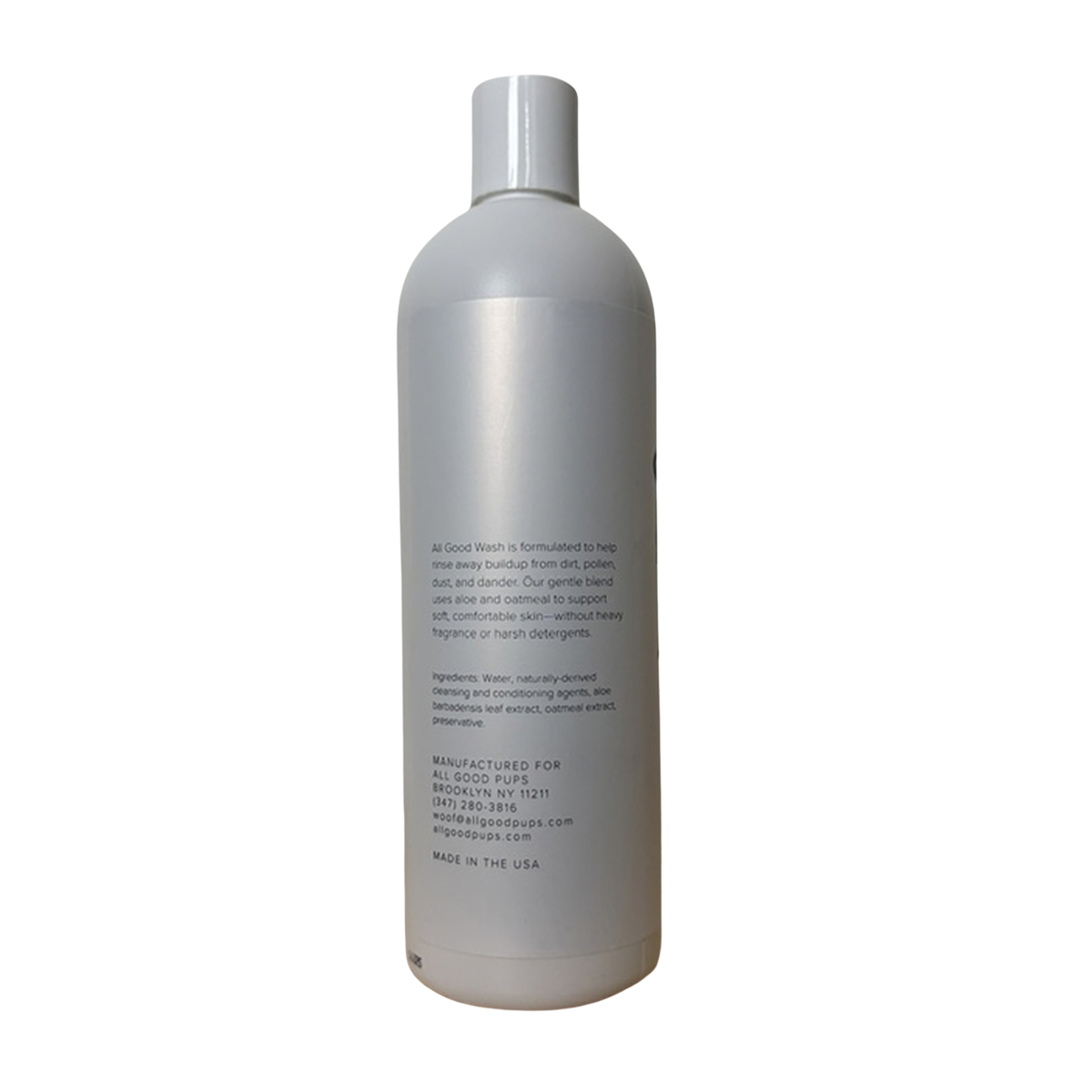A tall, white plastic bottle with a matching white cap, shown from the back against a plain white background. The bottle features black text detailing ingredients and manufacturing information.
